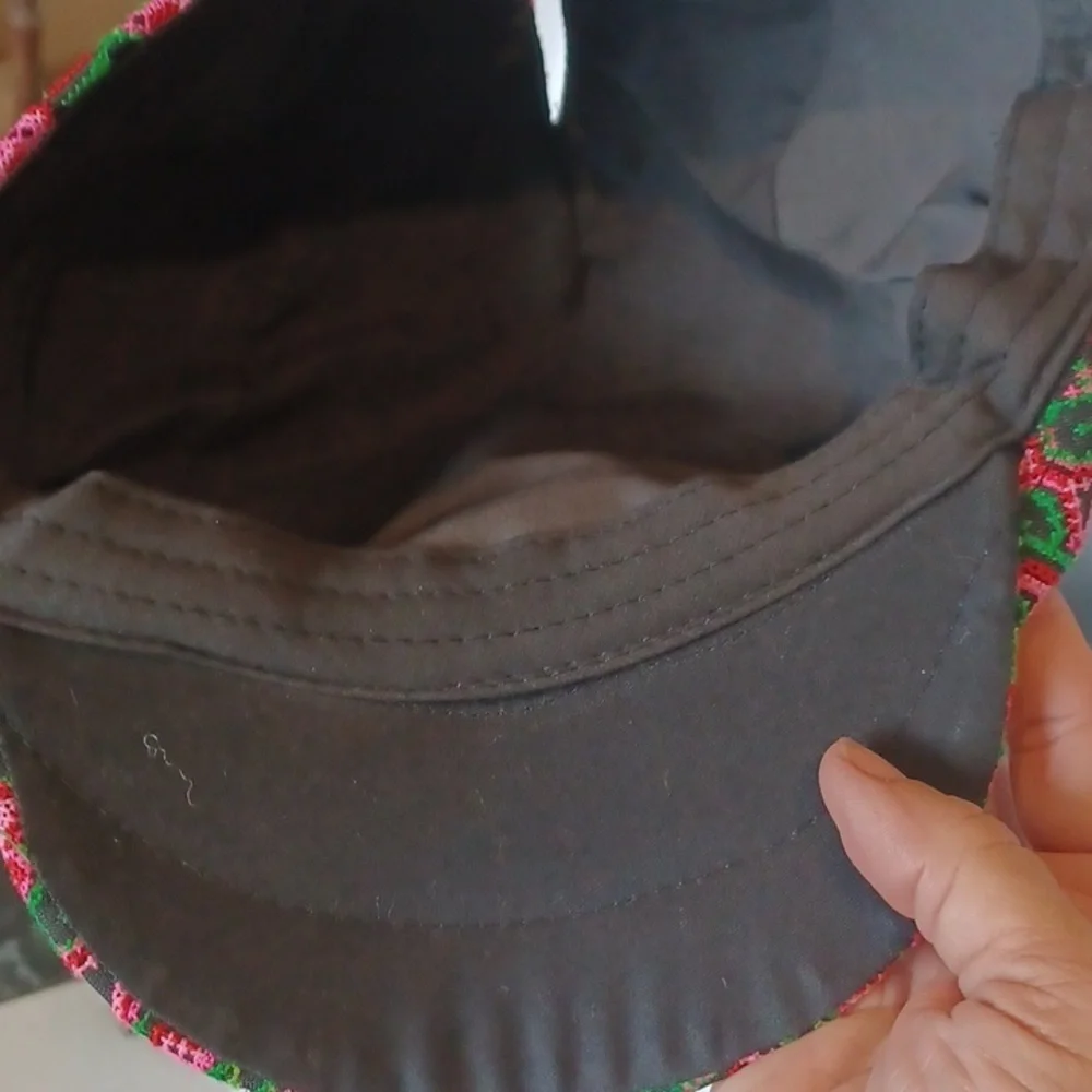 Embroidered ponytail hat.  Hair up, down, or in-between!          Size M/L.